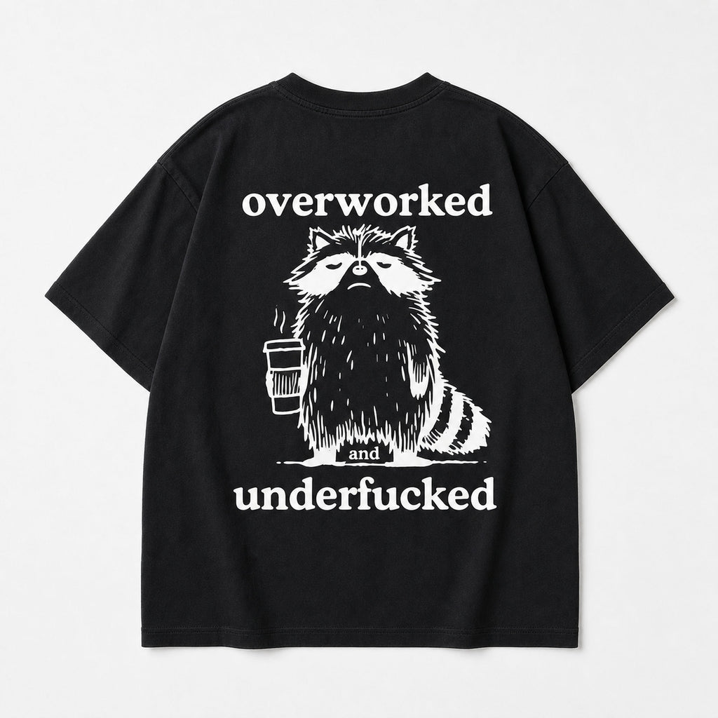 Overworked and Underfucked raccoon coffee graphic tee black back flat lay