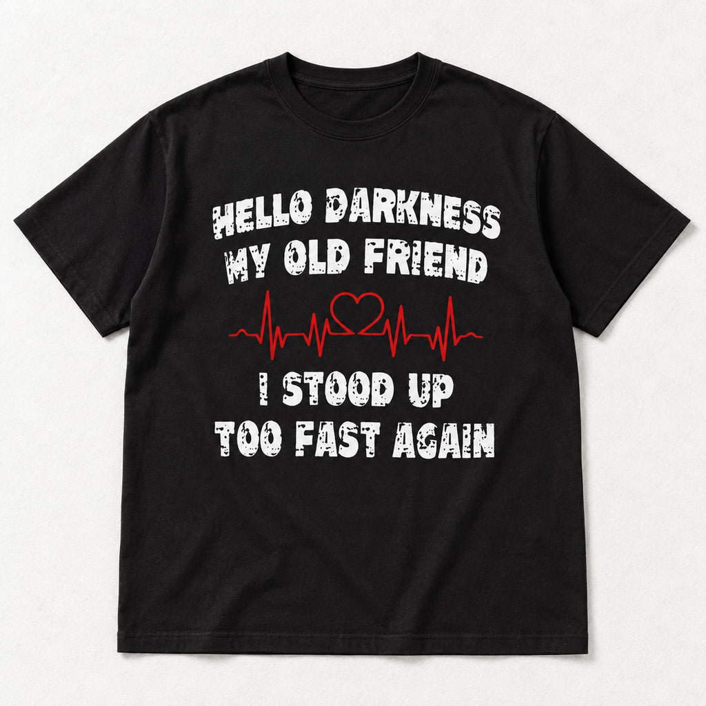 Hello Darkness My Old Friend black tee flat lay, front view with I Stood Up Too Fast Again punchline and red ECG-style graphic