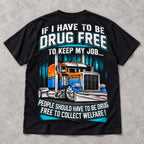 Drug Free Job welfare-policy semi-truck with turquoise accents graphic on black T-shirt back, flat lay showing complete print