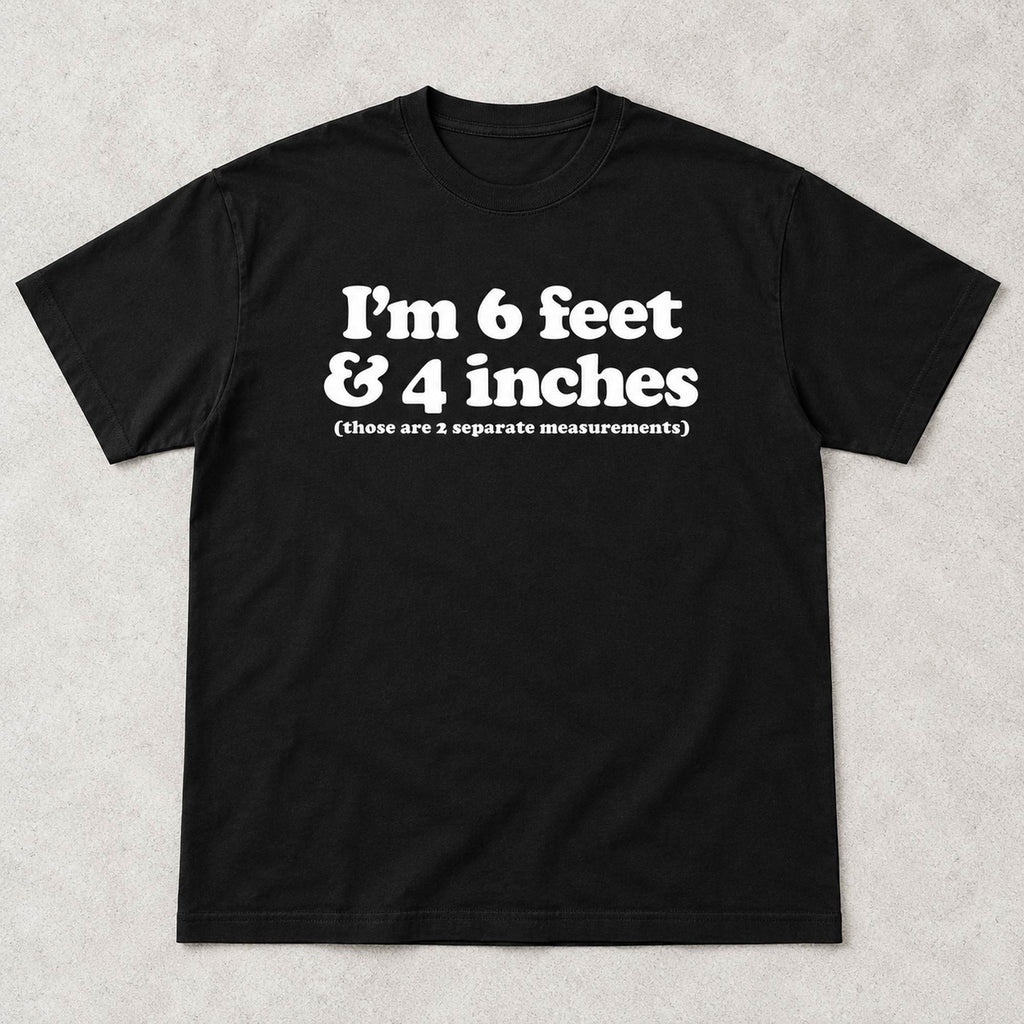 Black graphic tee front flat lay with I'm 6 Feet And 4 Inches design