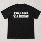 Black graphic tee front flat lay with I'm 6 Feet And 4 Inches design