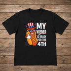 My Wiener Is Ready For The 4th funny hot dog graphic tee black front flat lay