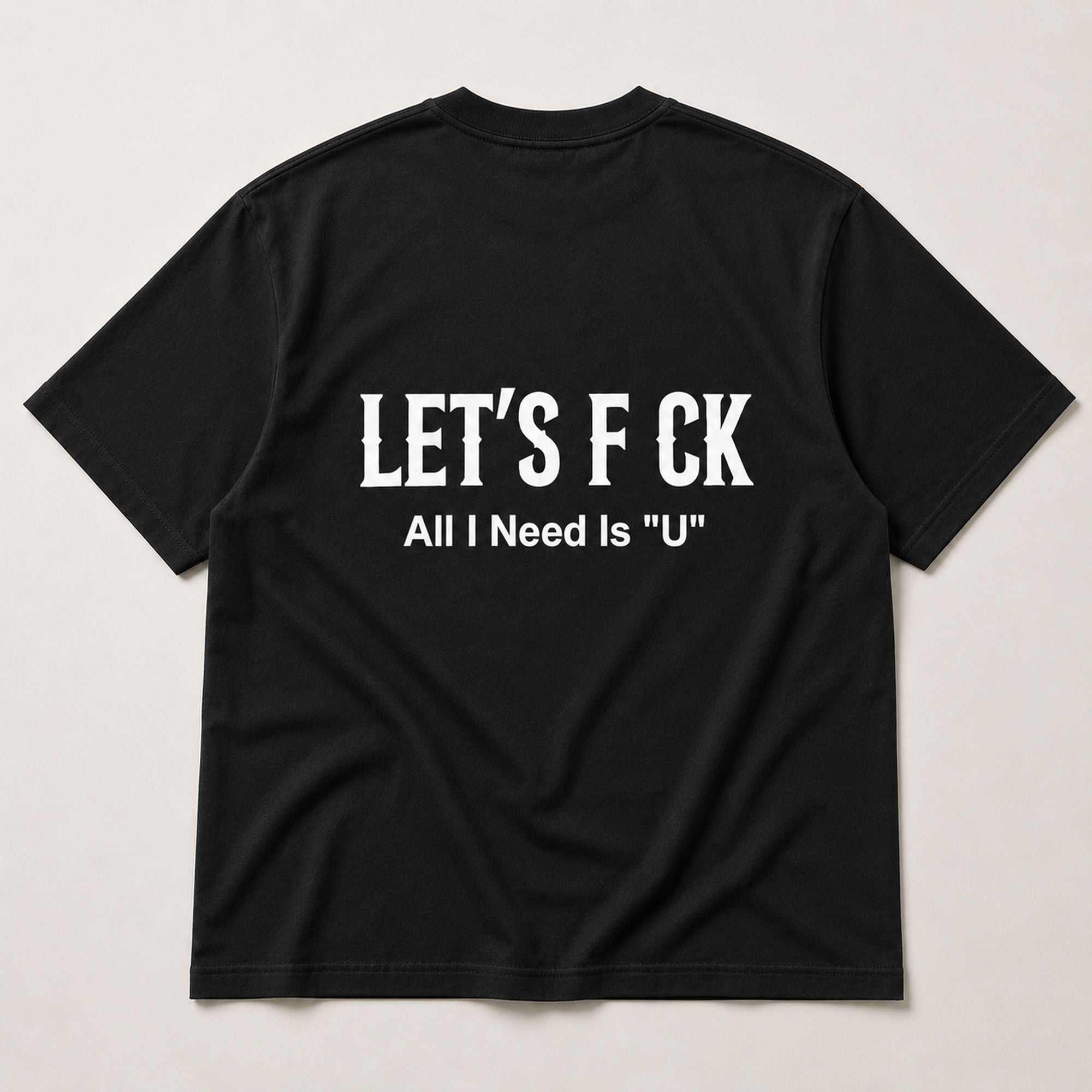 Let's F CK All I Need Is U funny graphic tee black back print flat lay
