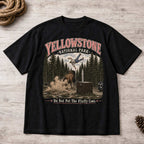 Yellowstone bison national park graphic tee black front flat lay with rope and pinecone