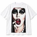 Cult glam horror portrait white graphic tee front flat lay with theatrical makeup artwork