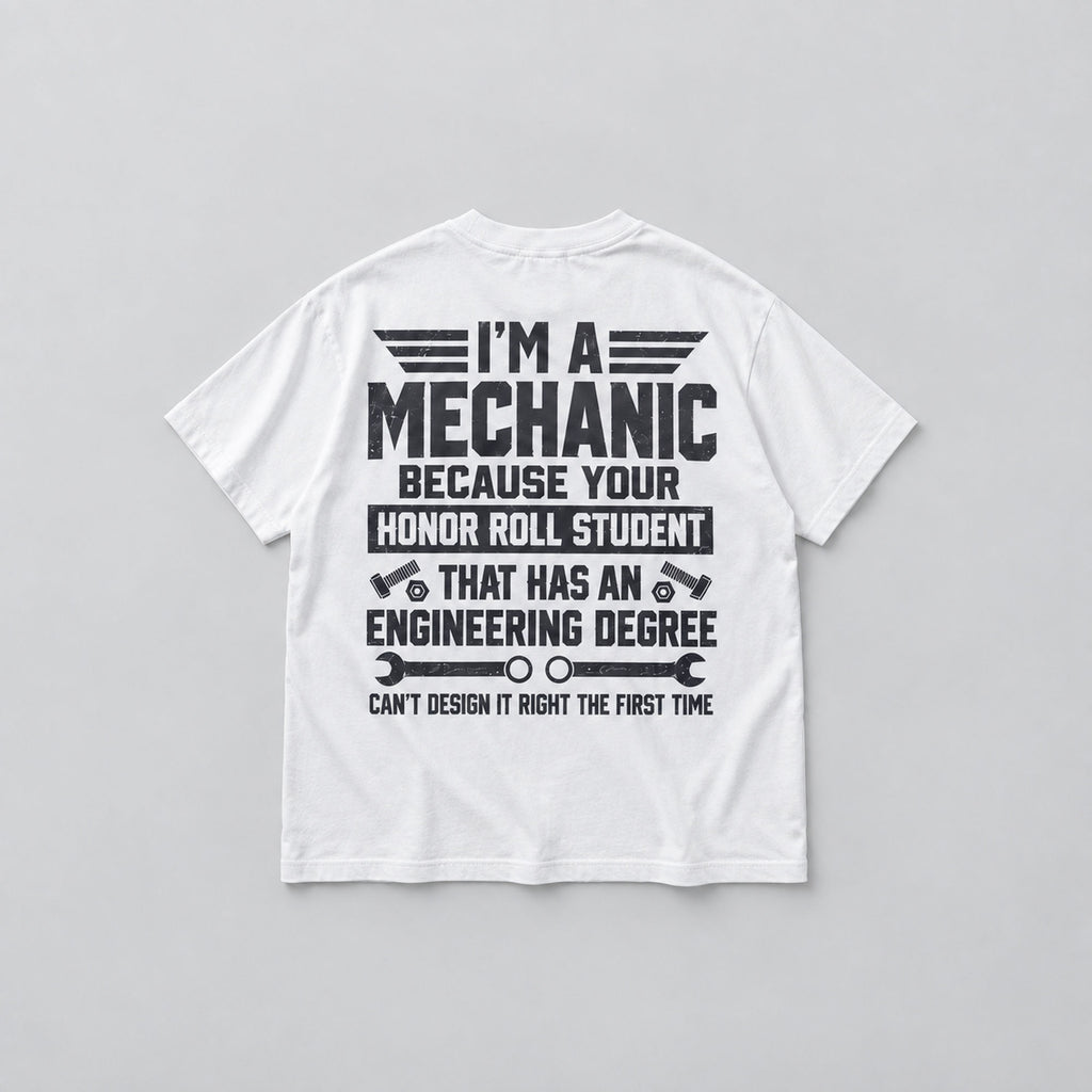 White I'm A Mechanic back-print graphic T-shirt, flat lay showing dark slogan and mechanic tools