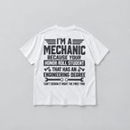 White I'm A Mechanic back-print graphic T-shirt, flat lay showing dark slogan and mechanic tools