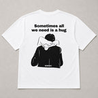 Sometimes All We Need Is A Hug graphic tee white back flat lay