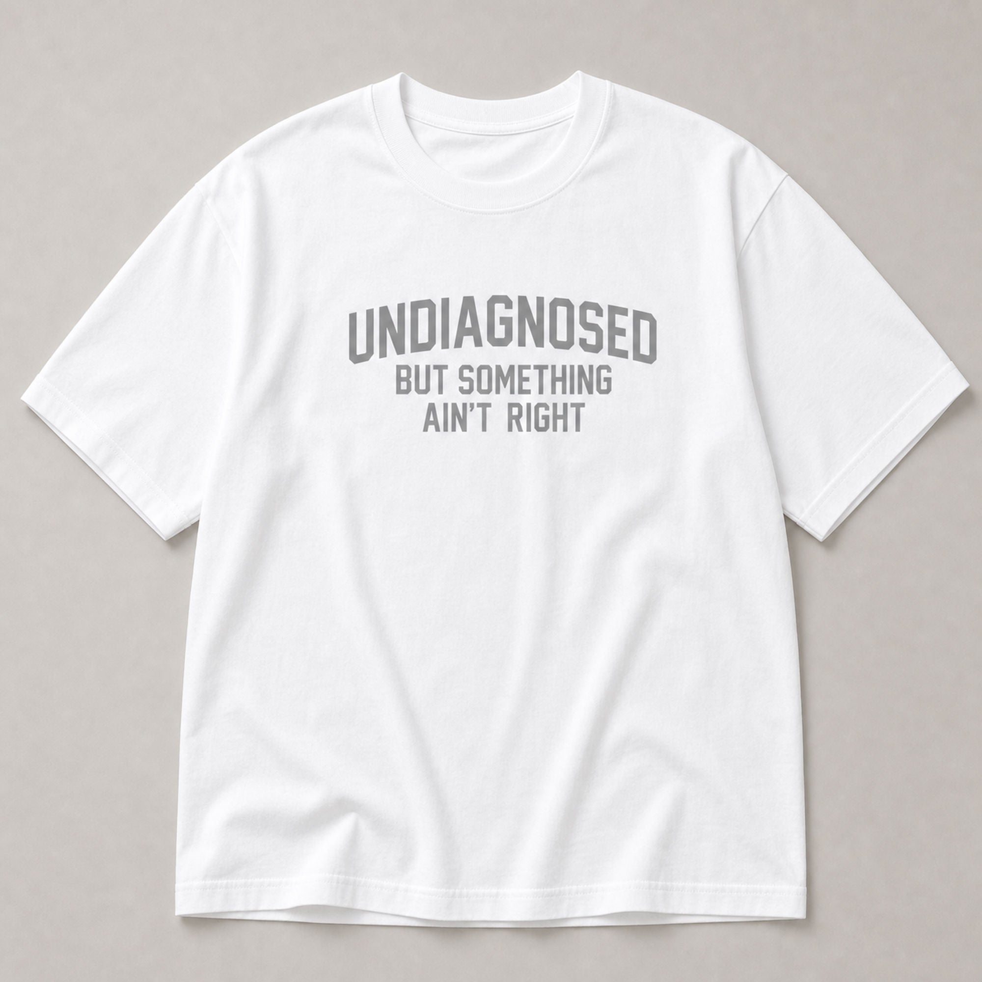 Undiagnosed But Something Ain't Right funny graphic tee white front flat lay