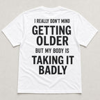 Getting Older Taking It Badly funny graphic tee white back print flat lay