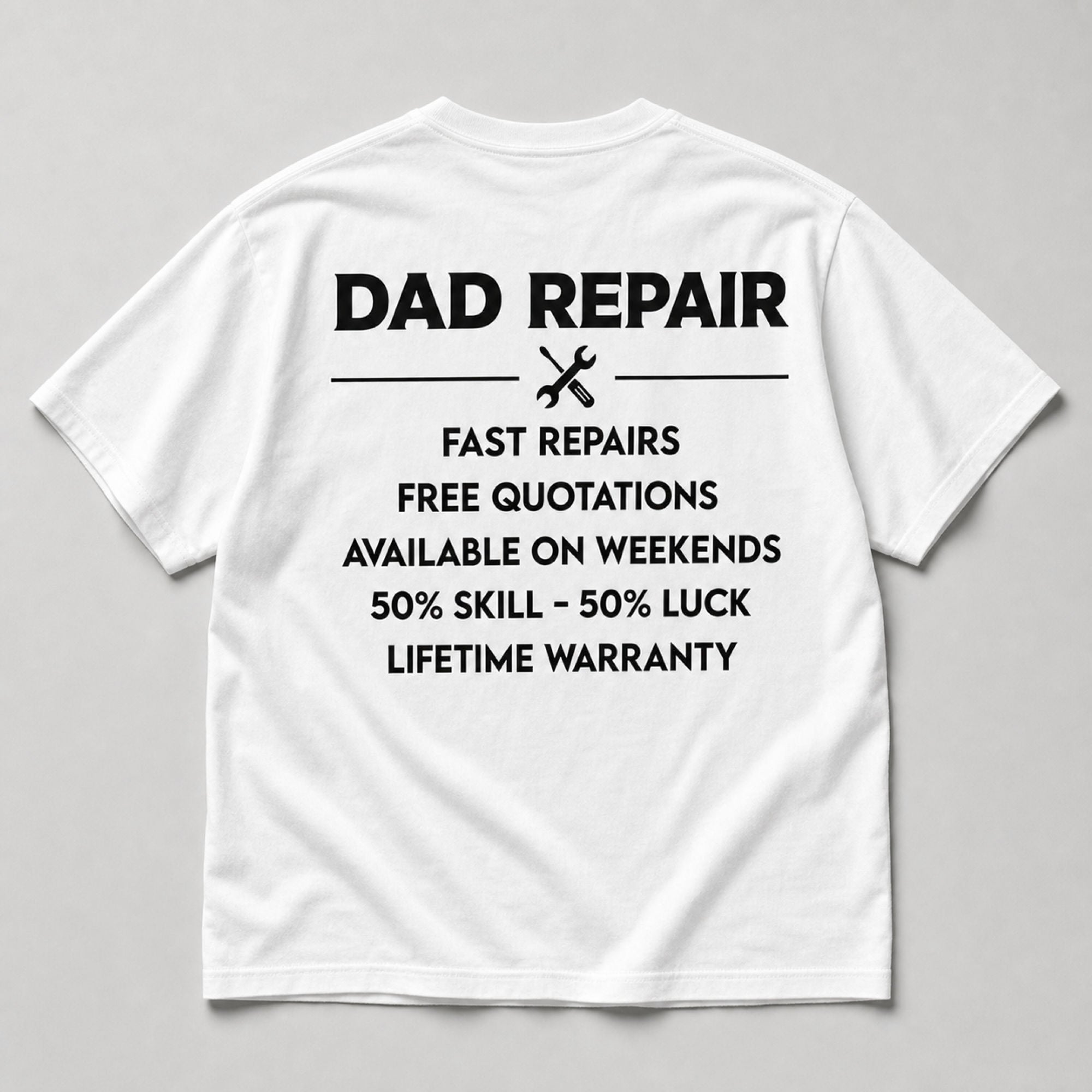 Dad Repair Service funny dad graphic tee white back flat lay