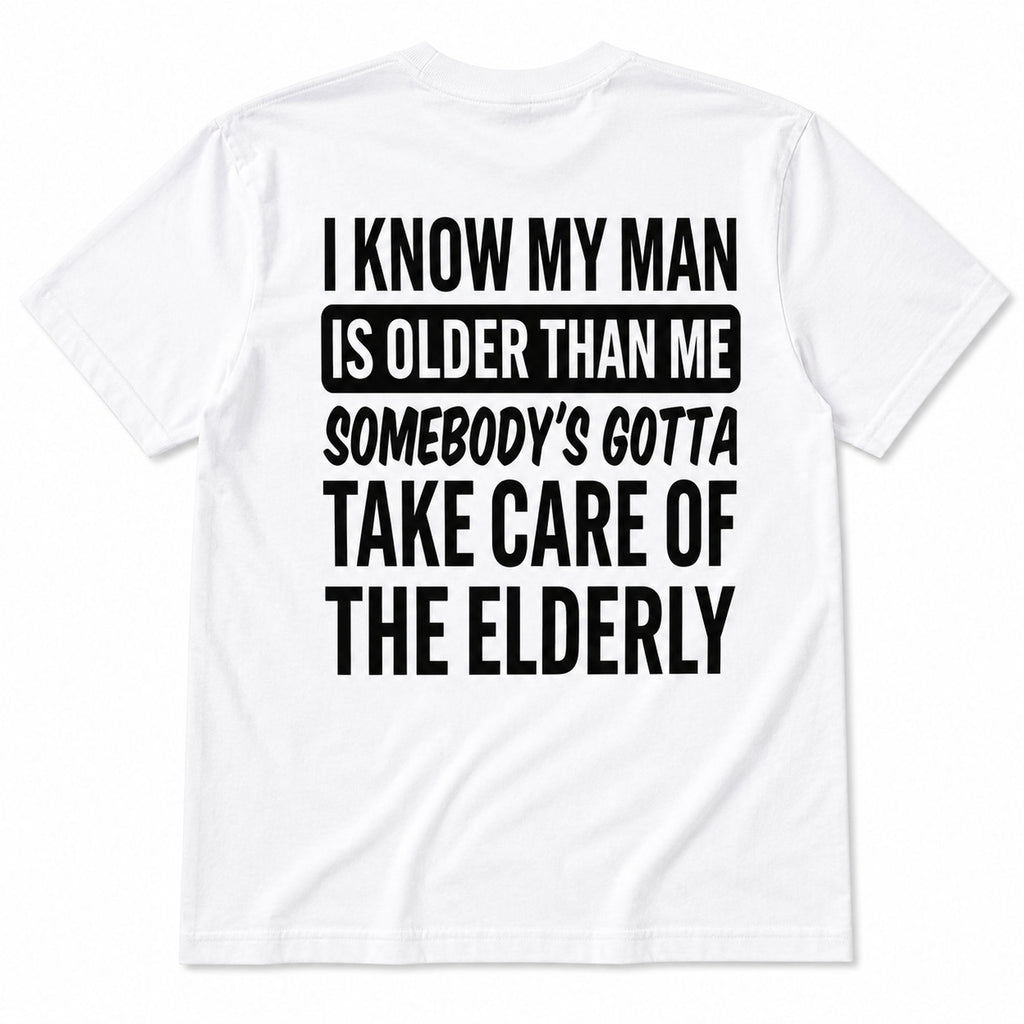 White I Know My Man Is Older Than Me graphic tee, full back flat-lay with black slogan