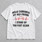 Hello Darkness My Old Friend white tee flat lay, front view showing distressed black slogan and red heartbeat graphic