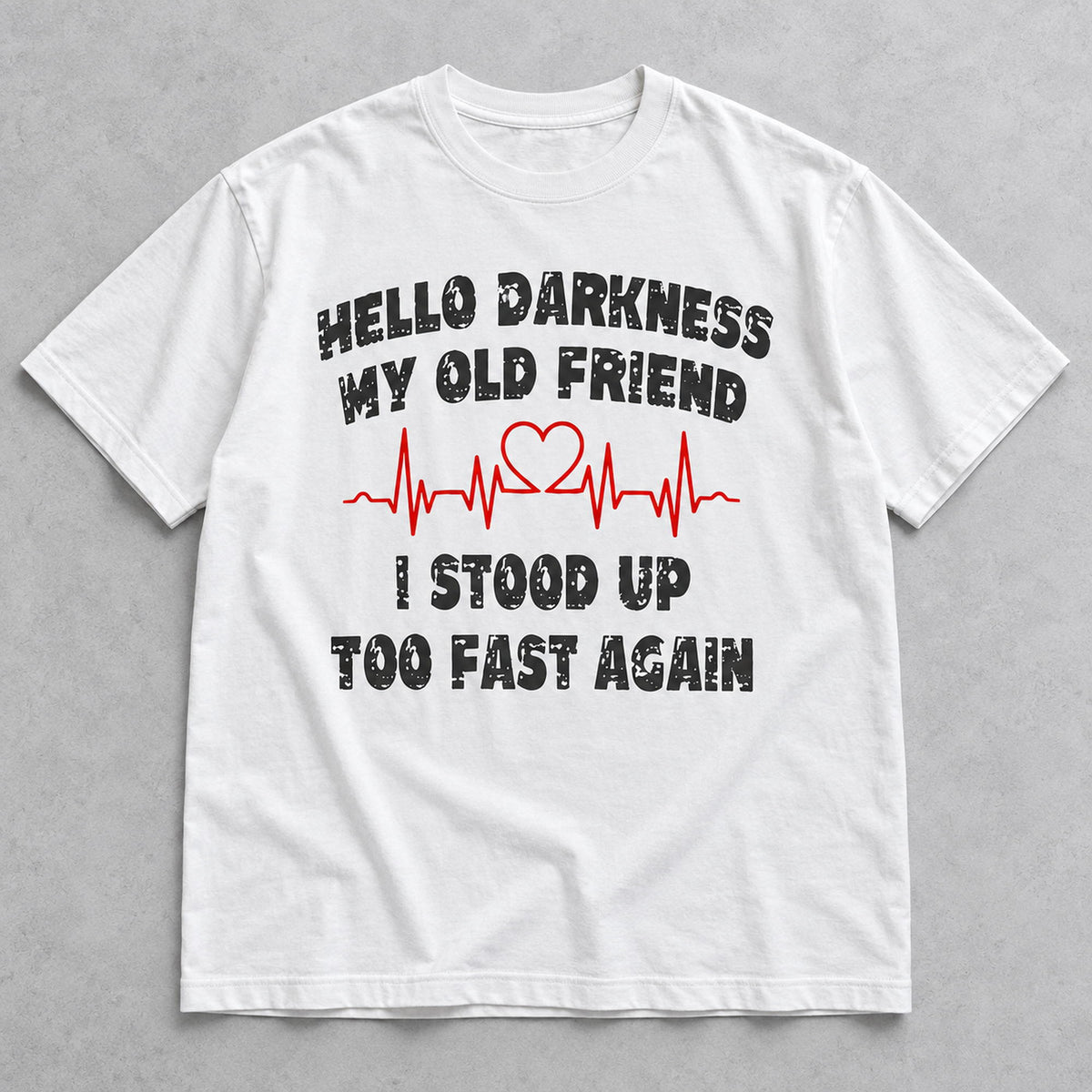 Hello Darkness My Old Friend white tee flat lay, front view showing distressed black slogan and red heartbeat graphic
