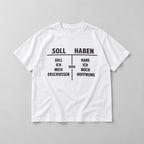 Soll Haben German accounting wordplay and original dark-humor table graphic on white T-shirt front, flat lay showing complete print