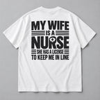My Wife Is a Nurse licensed to keep me in line quote white T-shirt back flat lay showing complete print