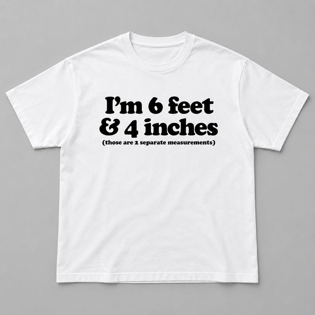 White graphic tee front flat lay with I'm 6 Feet And 4 Inches design