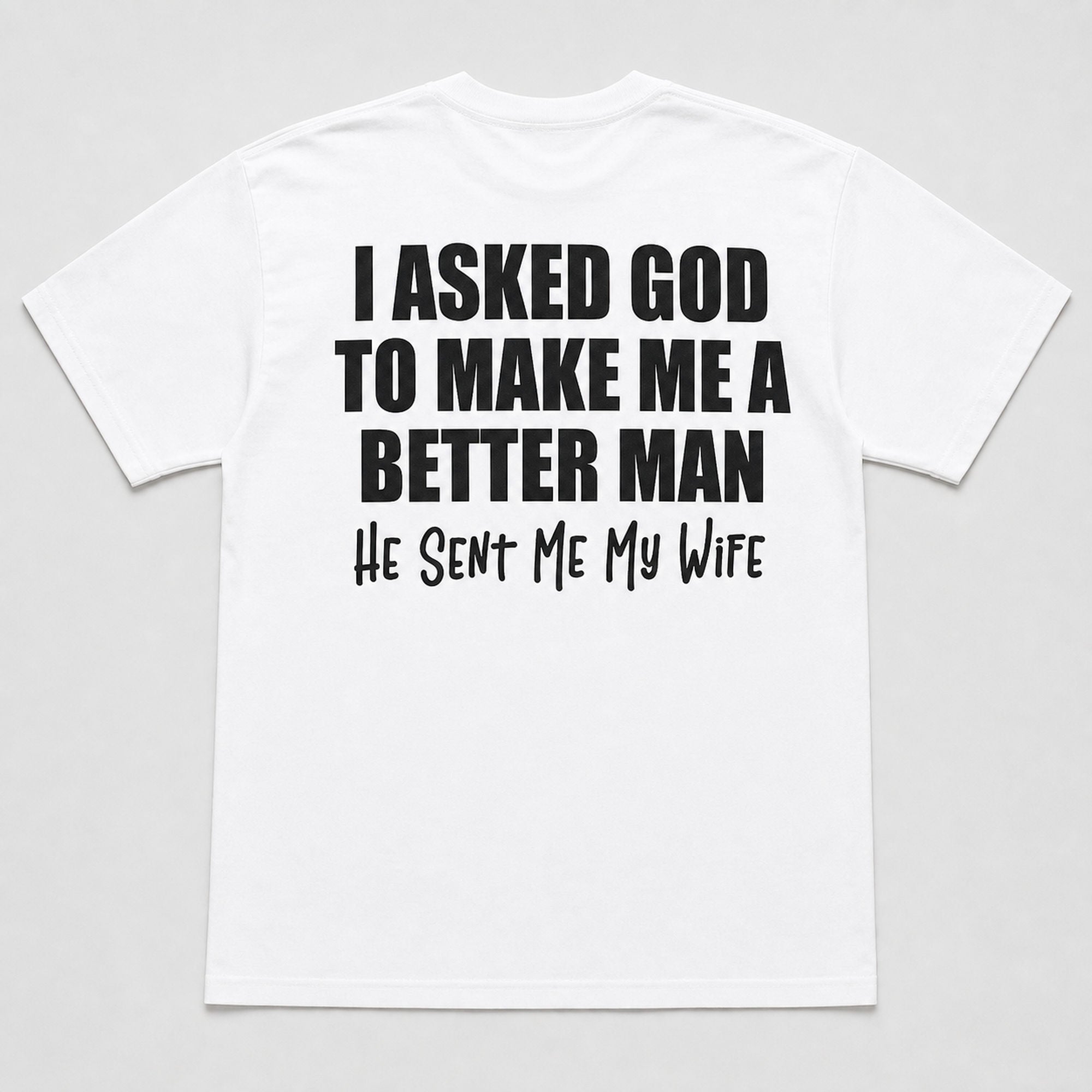 I Asked God Better Man wife faith graphic tee white back flat lay