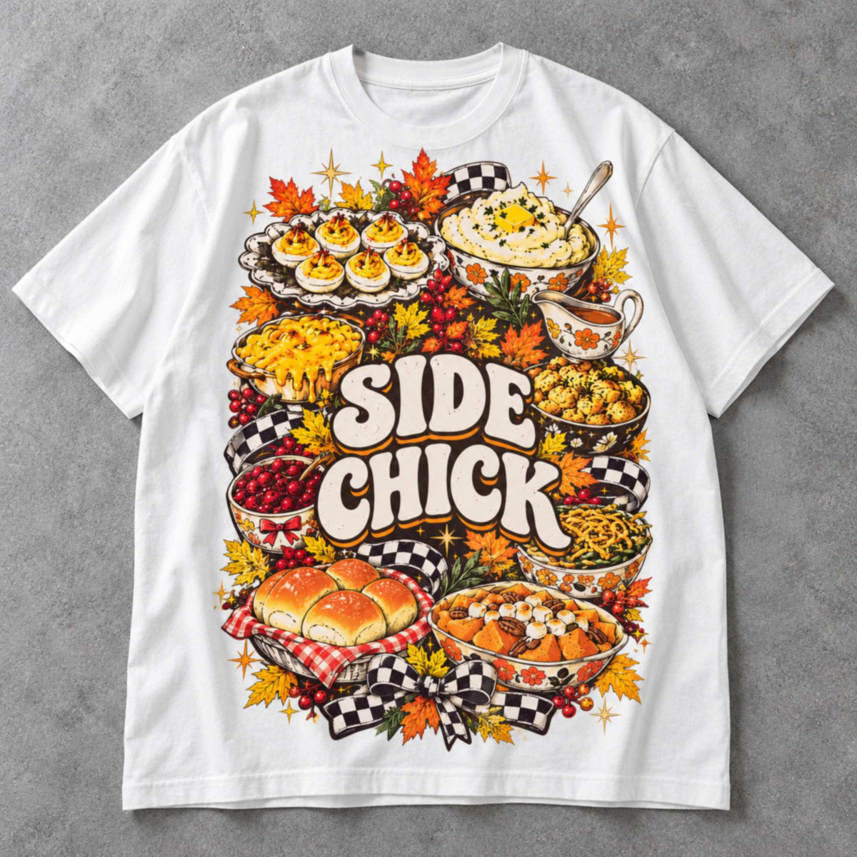Side Chick Thanksgiving food collage and autumn checkerboard graphic on white T-shirt front, flat lay showing complete print