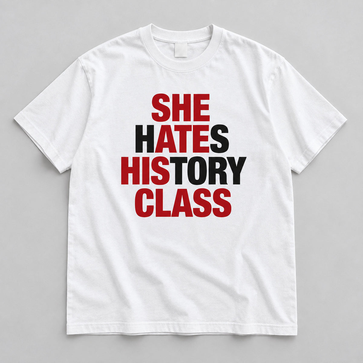 She Hates History Class white graphic T-shirt flat lay showing the color-block front slogan