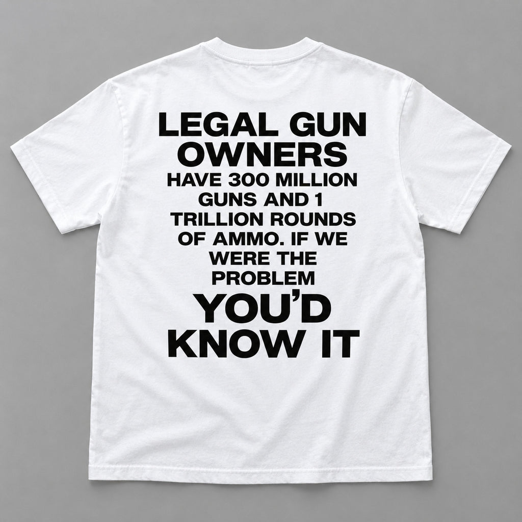 Legal Gun Owners statement back print on a white T-shirt, flat lay showing the complete lettering