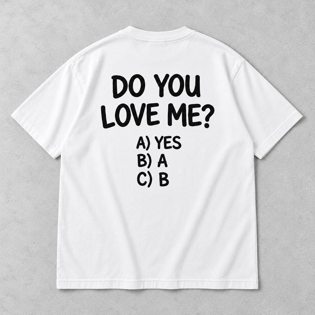 White graphic tee back flat lay with Do You Love Me design