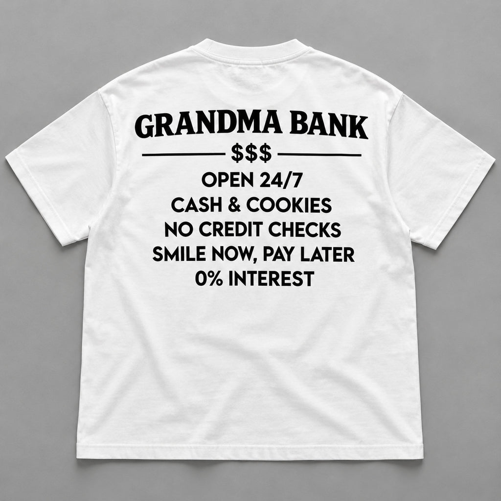 White graphic tee back flat lay with Grandma Bank lettering design