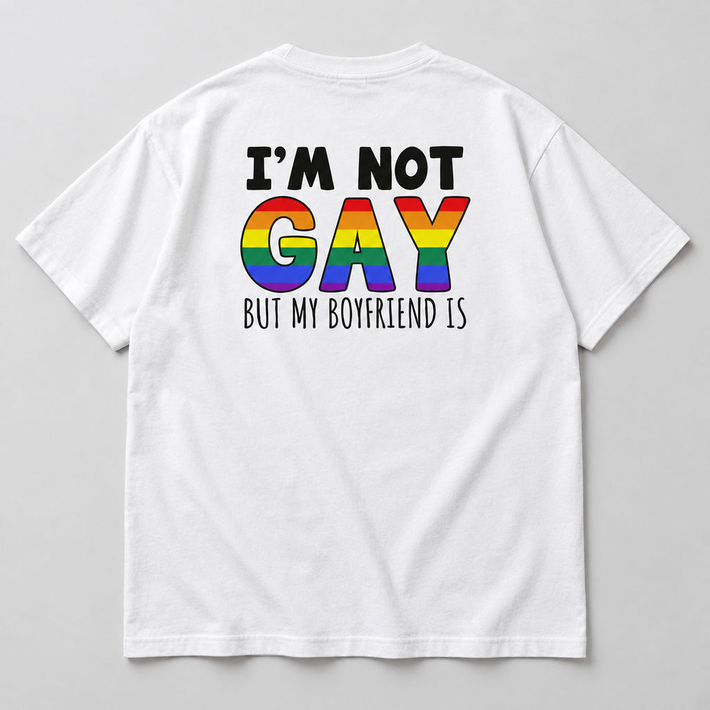 I'm Not Gay But My Boyfriend Is white tee flat lay, rear view showing the black text and rainbow slogan