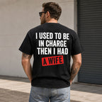 I Used To Be In Charge Then I Had A Wife funny graphic tee black back male model