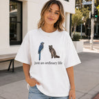 Just An Ordinary Life Blue Jay Raccoon Funny Graphic Tee front print product photo 01 | Diya Glow