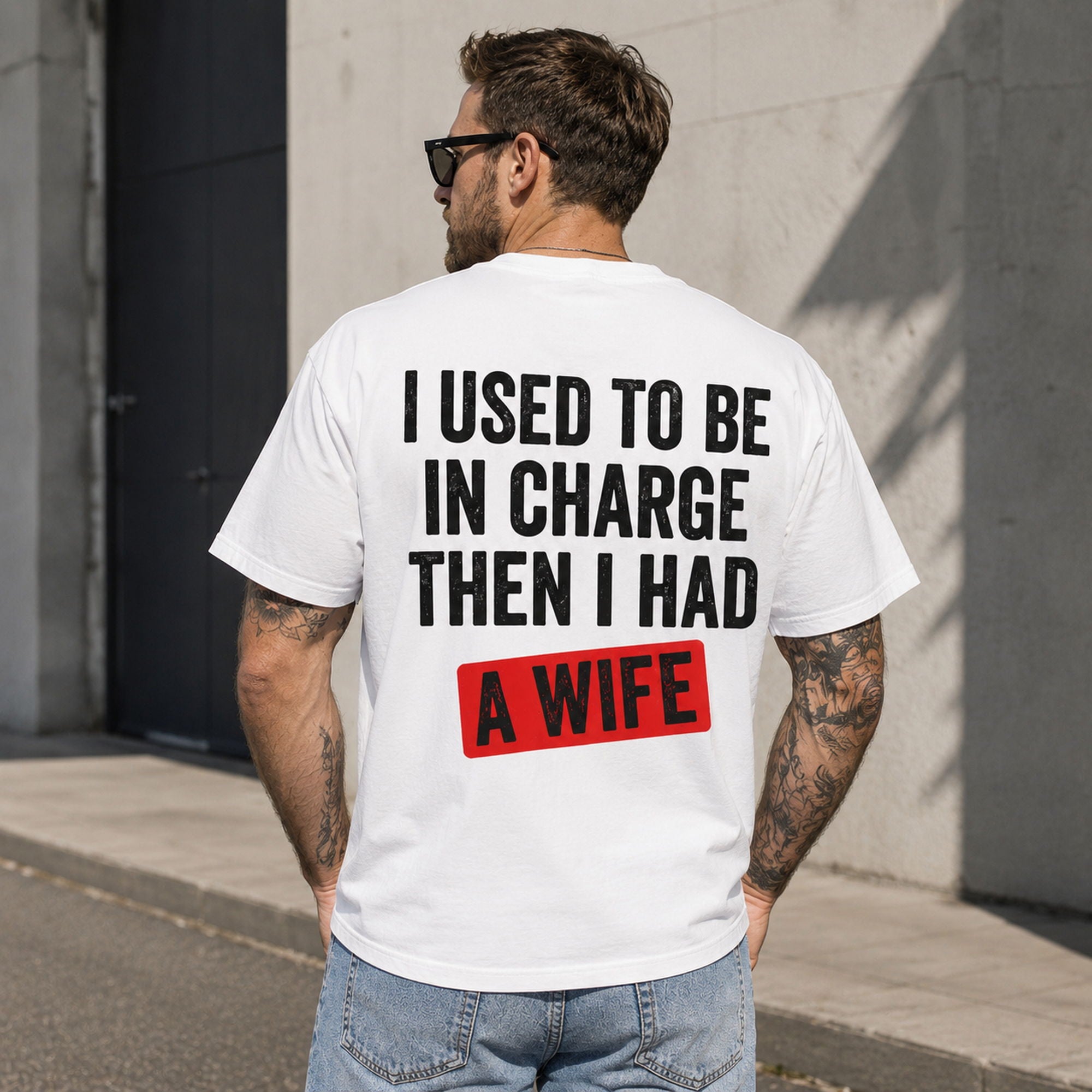 I Used To Be In Charge Then I Had A Wife funny graphic tee white back male model