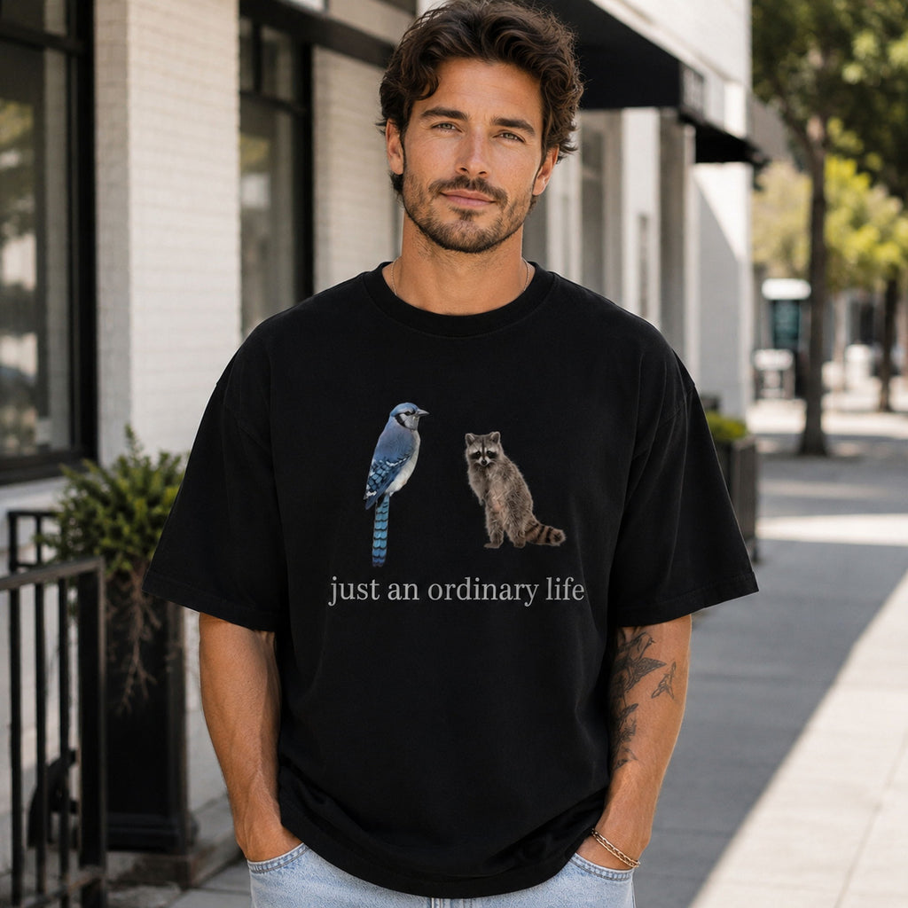 Just An Ordinary Life Blue Jay Raccoon Funny Graphic Tee front print product photo 03 | Diya Glow