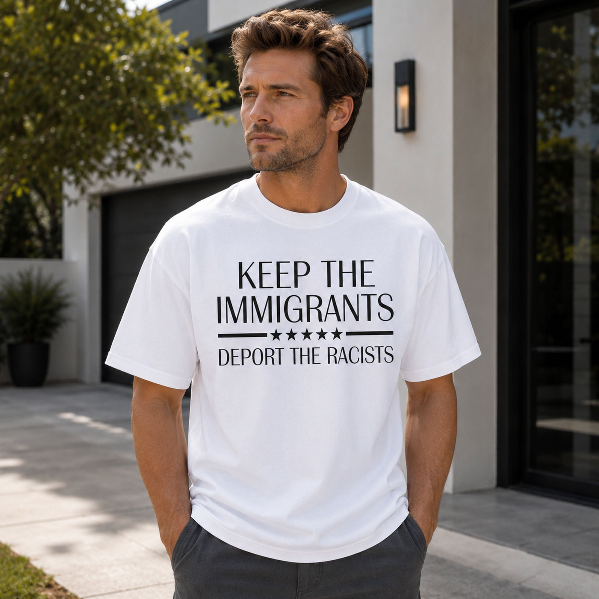 Keep The Immigrants Deport The Racists Statement Graphic Tee front print product photo 03 | Diya Glow