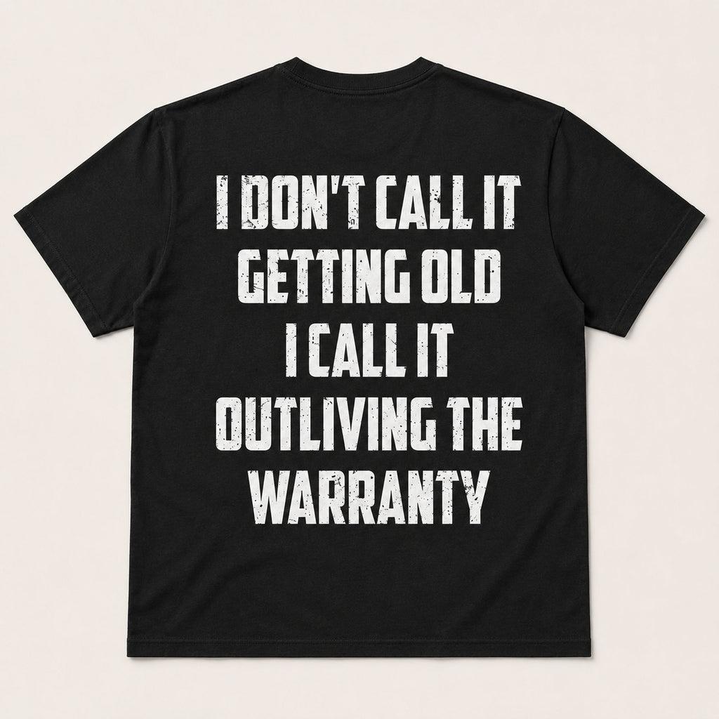 Outliving The Warranty funny aging graphic tee black back print flat lay