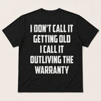 Outliving The Warranty funny aging graphic tee black back print flat lay