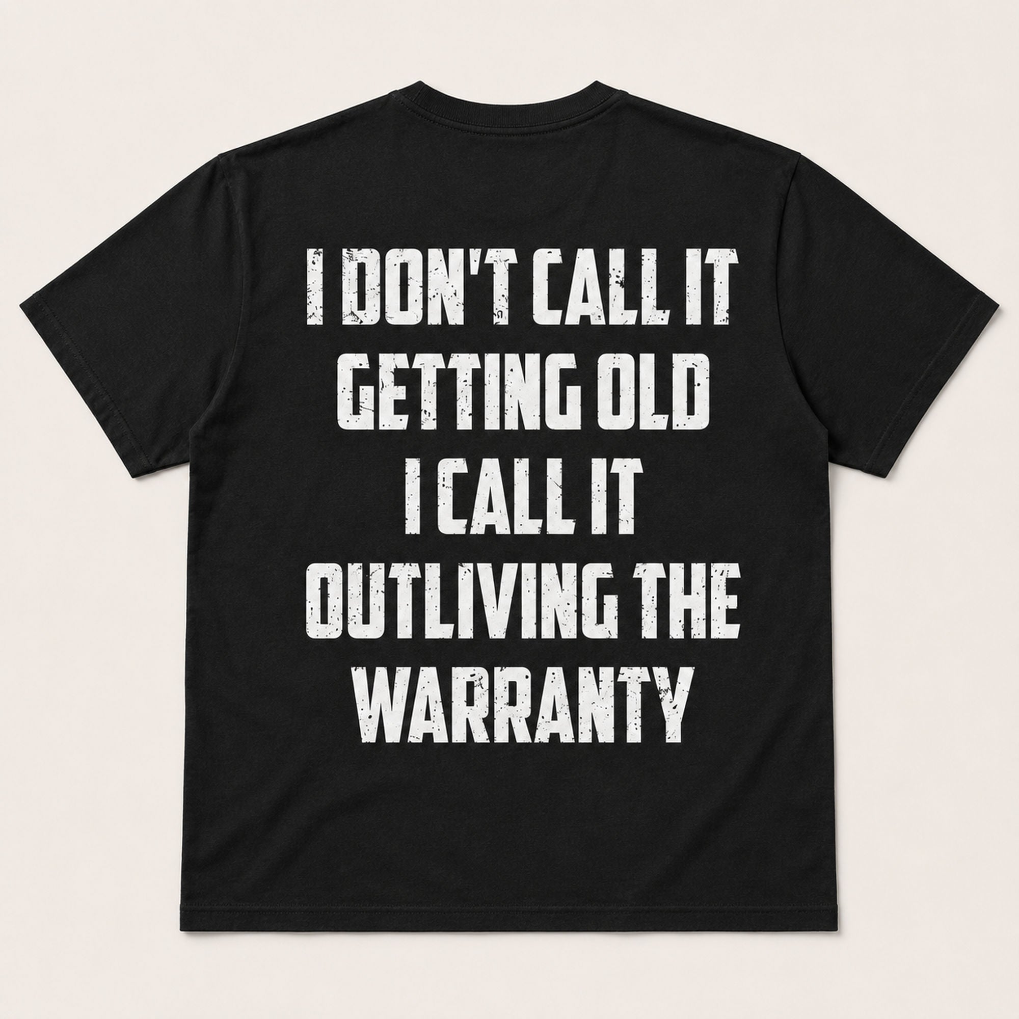 Outliving The Warranty funny aging graphic tee black back print flat lay