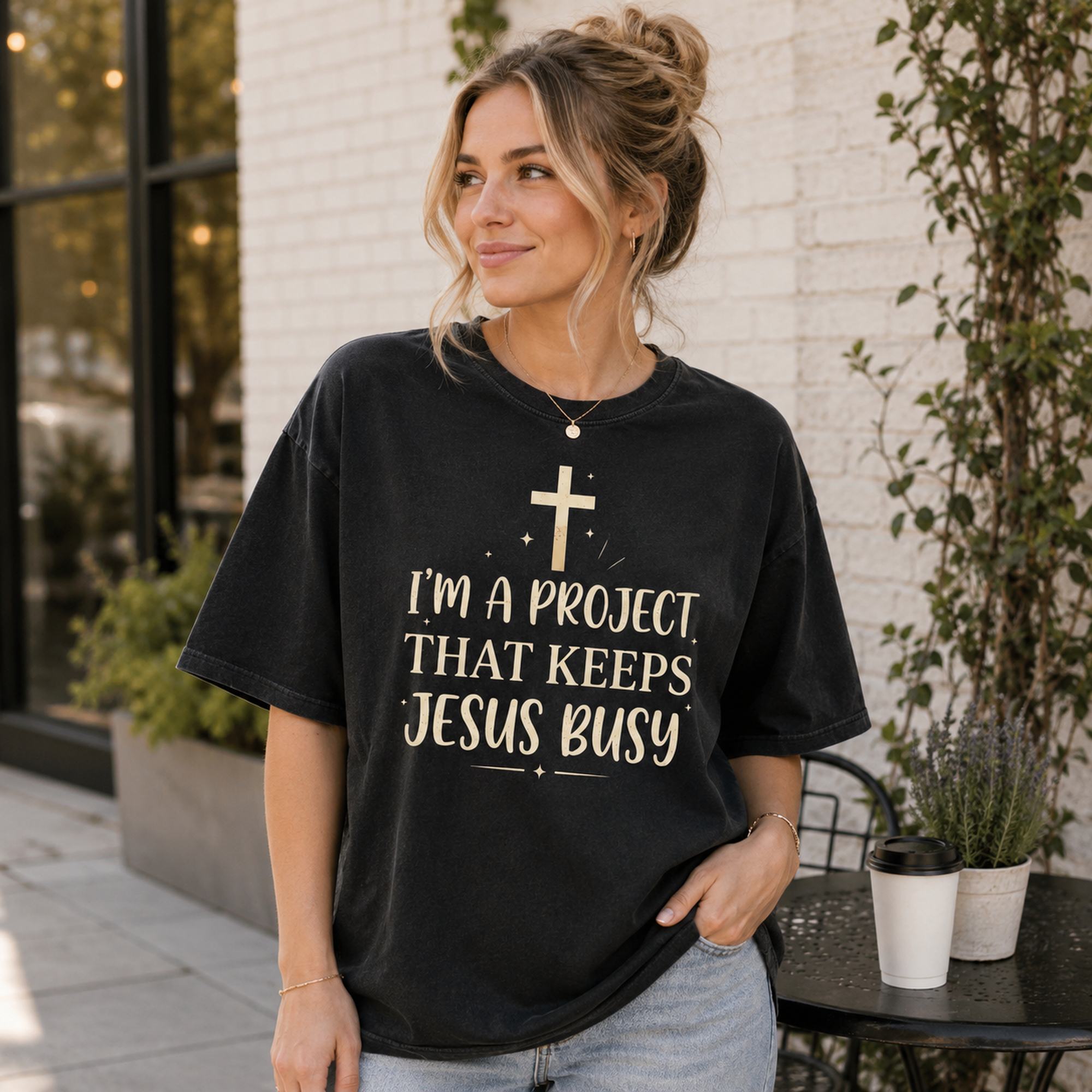I'm A Project That Keeps Jesus Busy Faith Graphic Tee front print product photo 03 | Diya Glow
