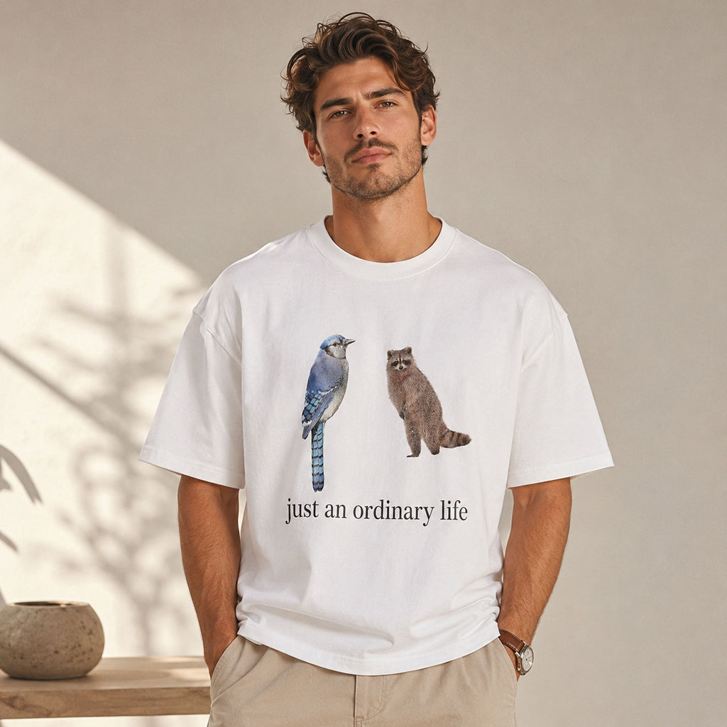 Just An Ordinary Life Blue Jay Raccoon Funny Graphic Tee front print product photo 04 | Diya Glow