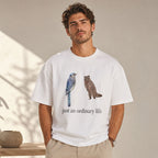 Just An Ordinary Life Blue Jay Raccoon Funny Graphic Tee front print product photo 04 | Diya Glow