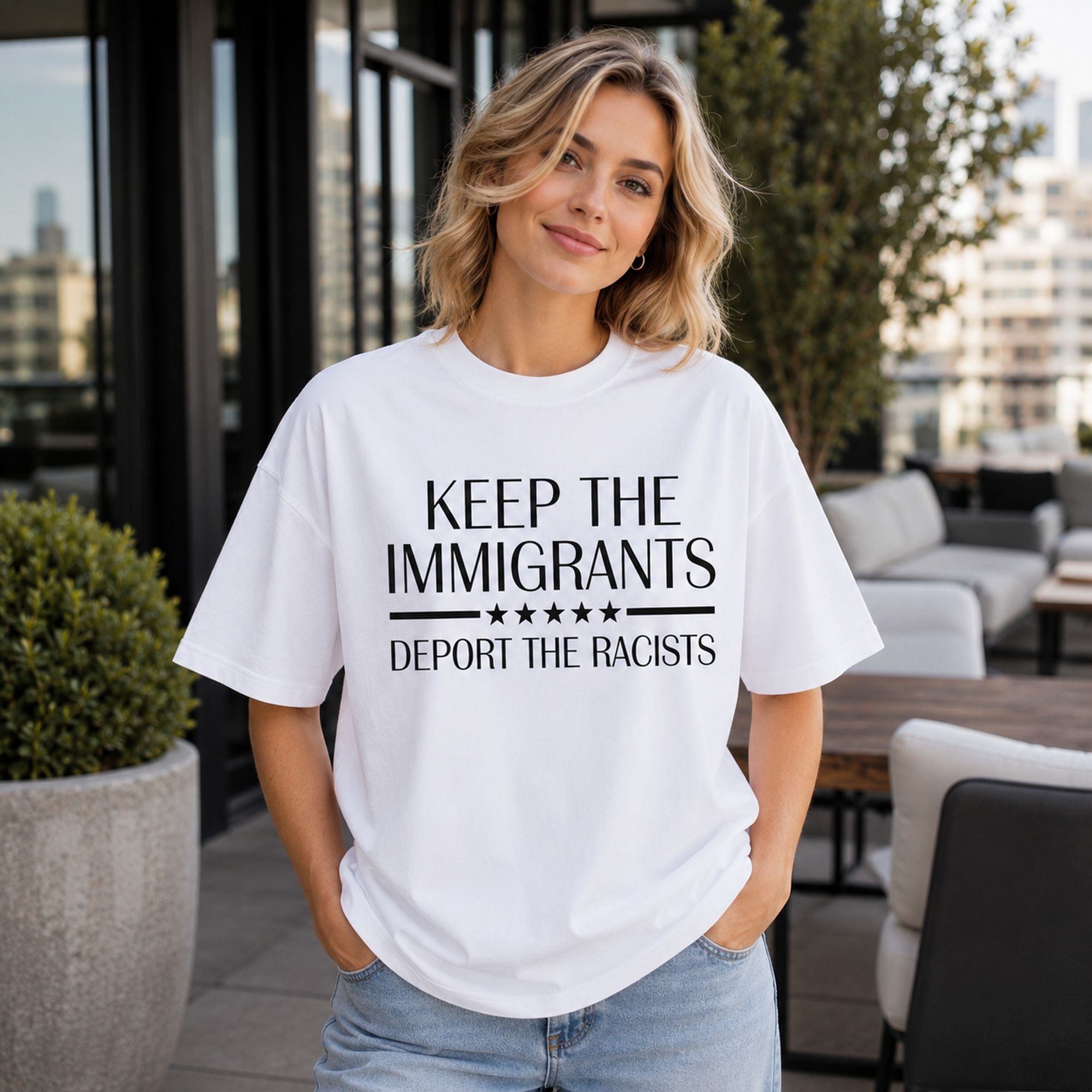 Keep The Immigrants Deport The Racists Statement Graphic Tee front print product photo 04 | Diya Glow