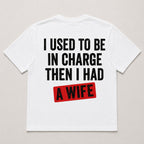 I Used To Be In Charge Then I Had A Wife funny graphic tee white back flat lay