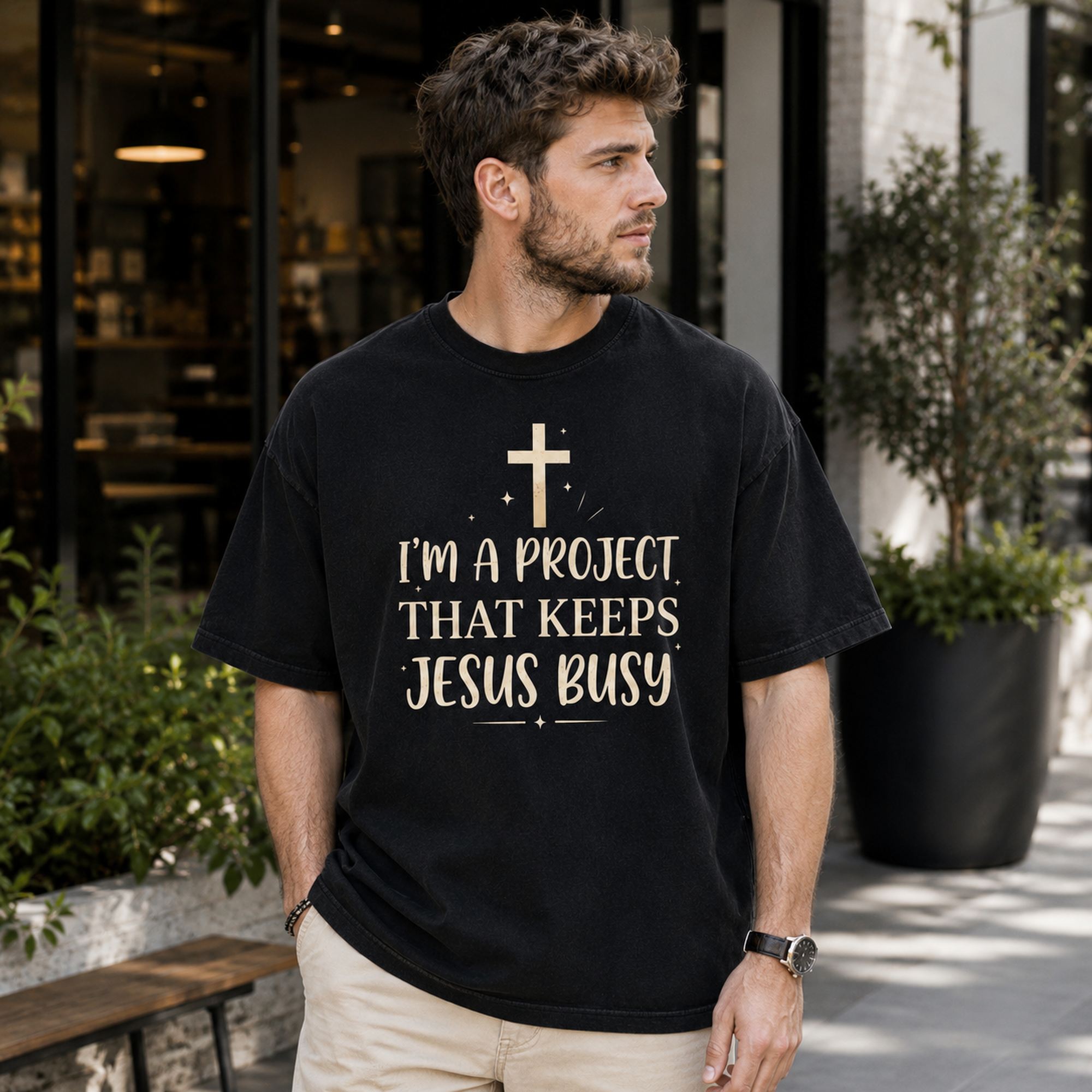 I'm A Project That Keeps Jesus Busy Faith Graphic Tee front print product photo 04 | Diya Glow