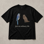Just An Ordinary Life Blue Jay Raccoon Funny Graphic Tee front print product photo 05 | Diya Glow