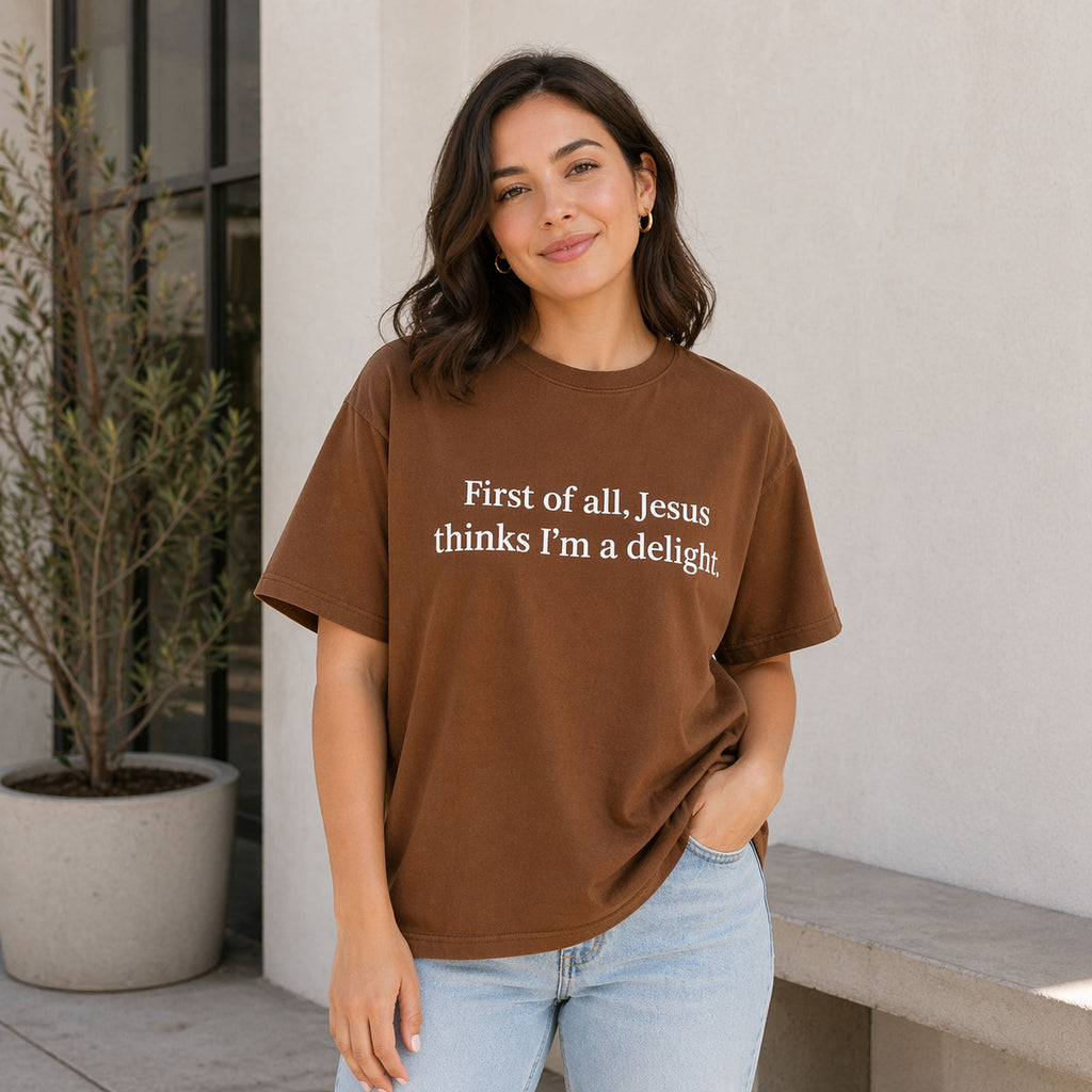 First Of All Jesus Thinks I'm A Delight Faith Graphic Tee front print product photo 05 | Diya Glow