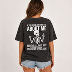 Woman wearing black If You Heard Anything Bad About Me funny skeleton back-print graphic tee