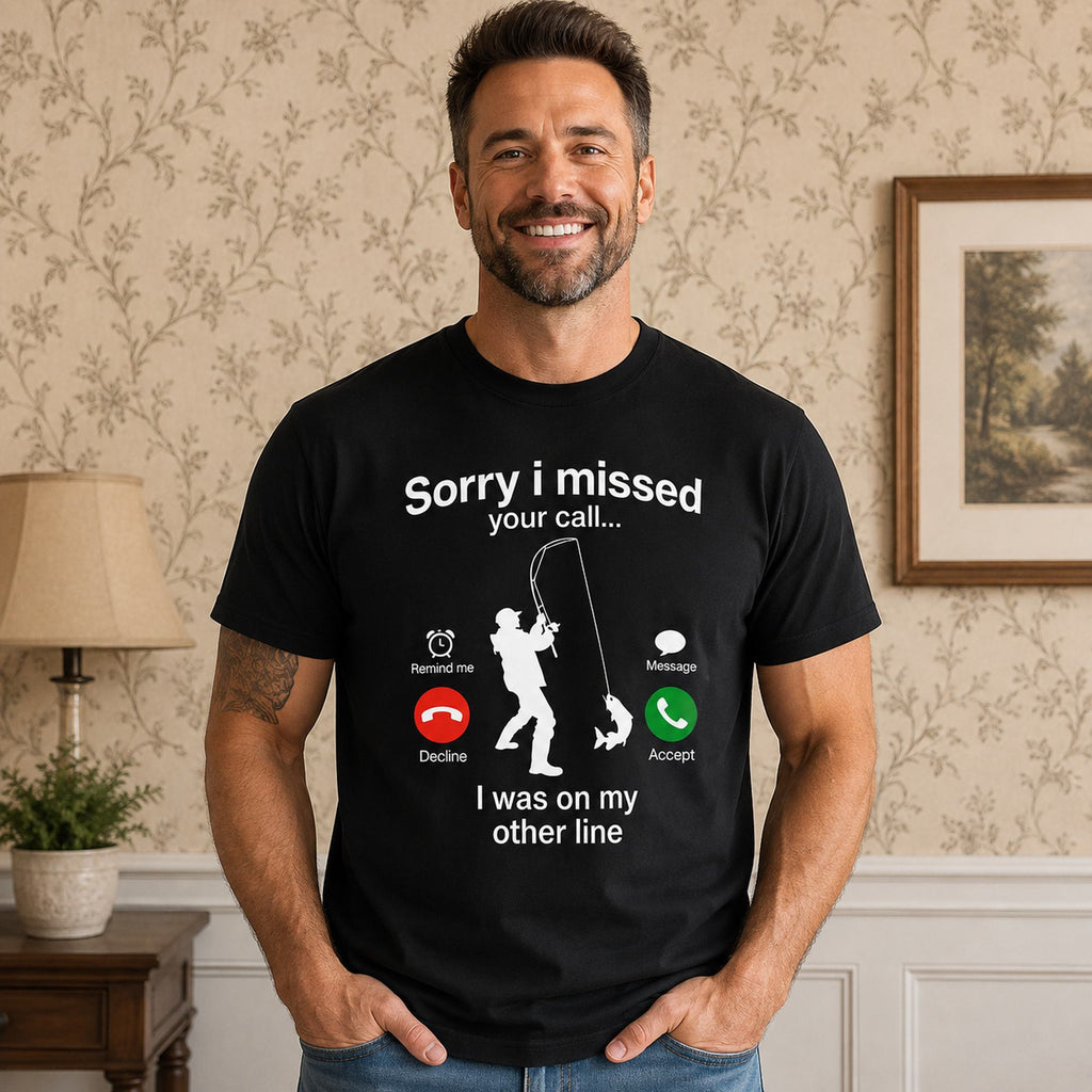 Funny fishing missed-call graphic tee black front on male model in neutral home setting