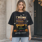 Spooky Season retro horror VHS stack graphic tee washed black front print female model outdoors