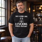 Do I Look Like A Fucking People Person graphic tee black front print on male model in a pub