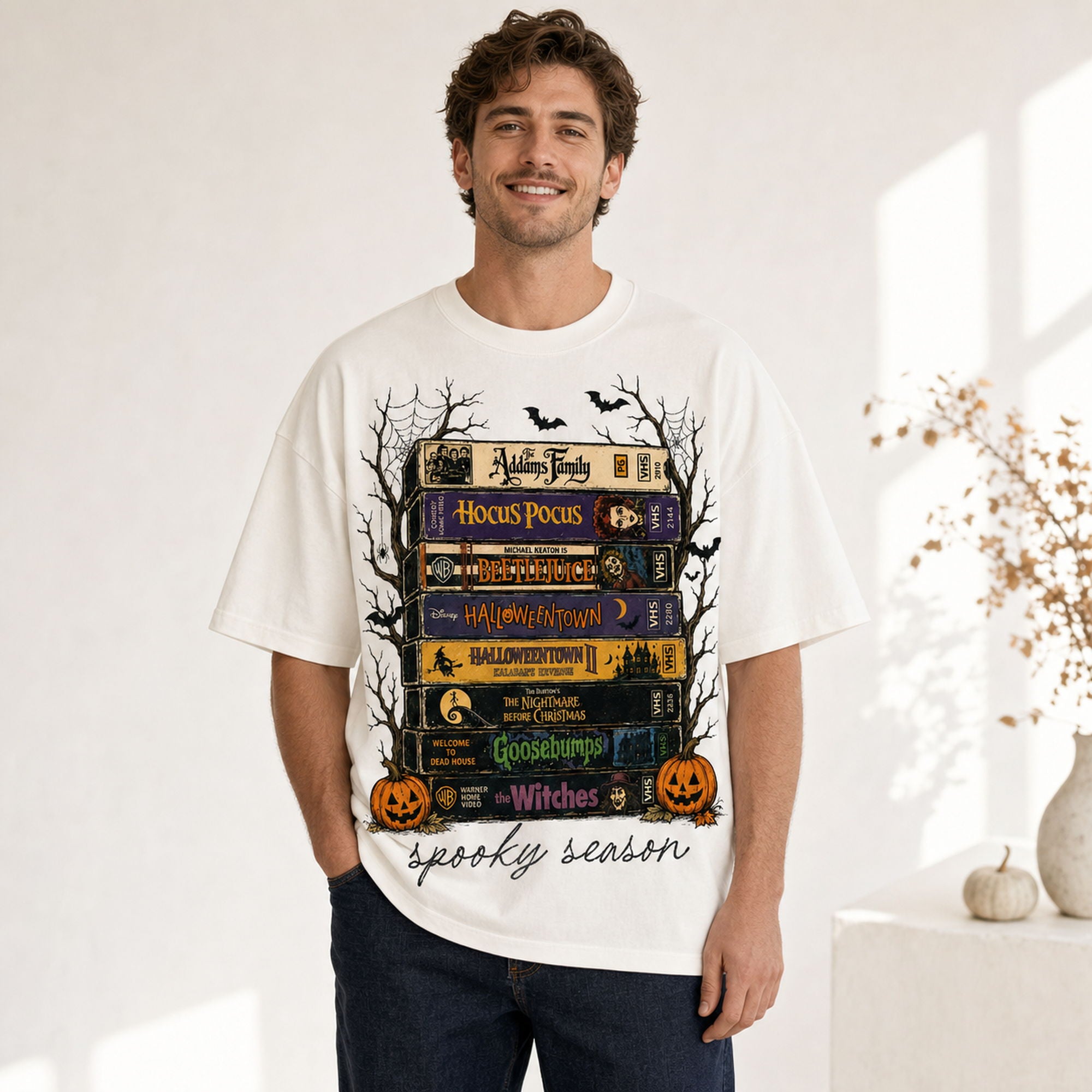 Spooky Season retro horror VHS stack graphic tee ivory front print male model studio