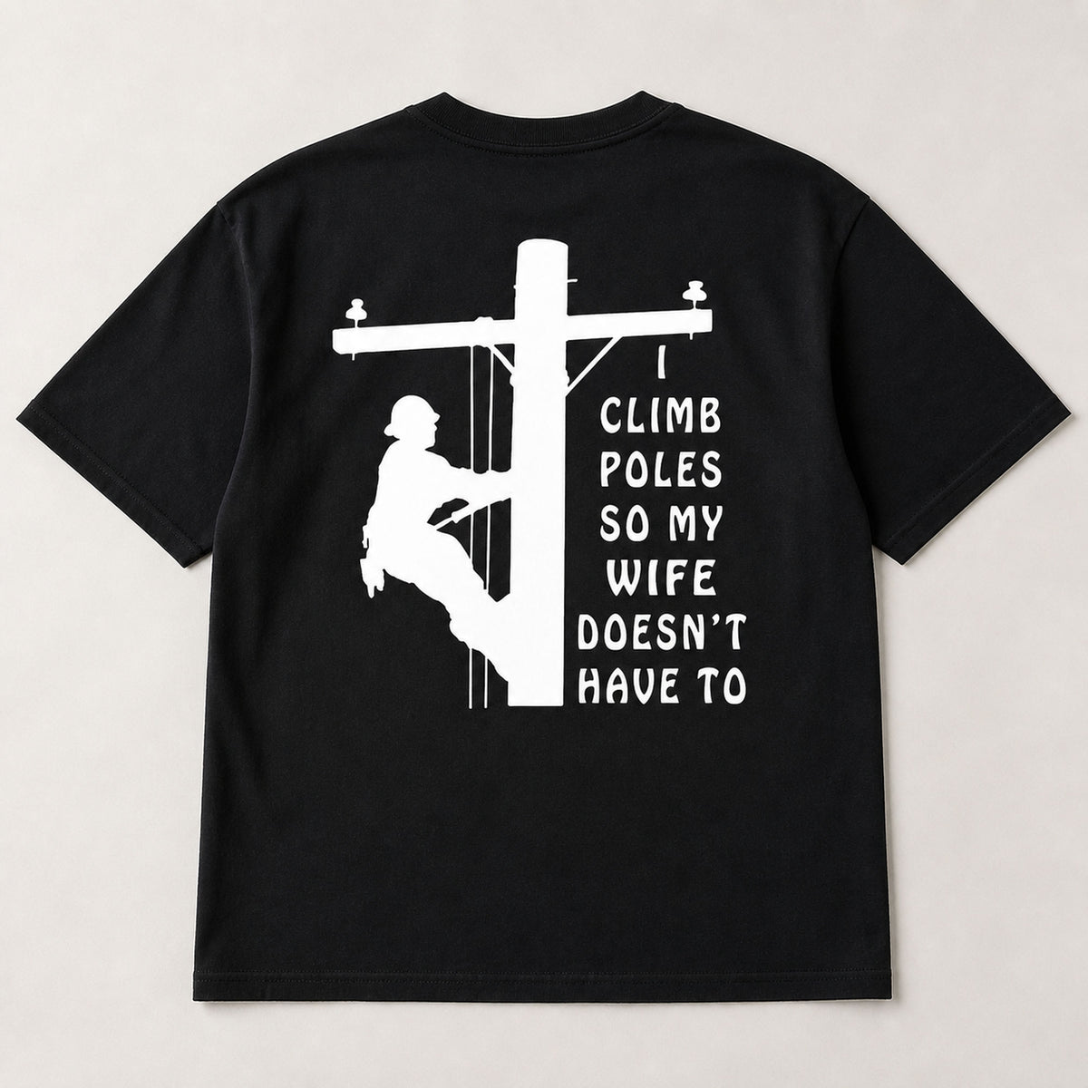 I Climb Poles lineman graphic tee black back print flat lay